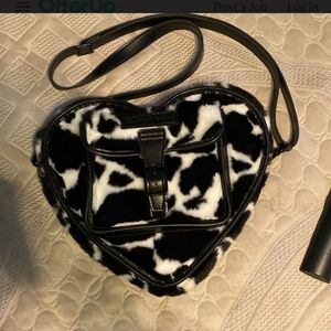 Dr. Martens faux fur hearr shaped pyrse